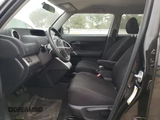 2009 Scion xB with VIN JTLKE50E491063990, listed as a Copart auction lot 53448265 with 152,420 mi miles and Salvage Title. Bid and sale history available at DreamBid. Image 7.
