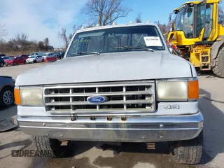 1988 Ford F-250 with VIN 1FTHF26H0JNA06718, listed as a IAAI auction lot 41530940 with 77,610 mi miles. Bid and sale history available at carsss.com. Image 12.