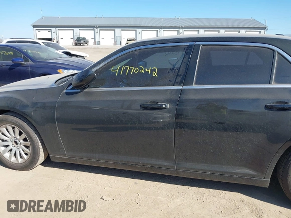 2014 Chrysler 300 with VIN 2C3CCAAG3EH252841, listed as a IAAI auction lot 41770242 with 214,000 mi miles. Bid and sale history available at carsss.com. Image 14.