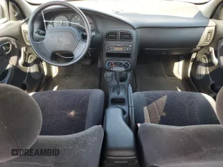2000 Saturn SL z VIN 1G8ZK5279YZ252761, wystawiony jako Copart lot #63204475 z przebiegiem 80 646 mil mil oraz Czysty tytuł • Clean title. Historia ofert i sprzedaży dostępna na DreamBid. Obrazek 8.