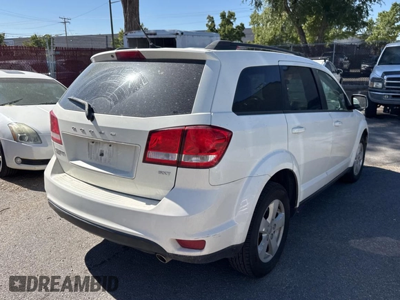 2012 Dodge Journey SXT with VIN 3C4PDDBG6CT249396, listed as a Copart auction lot 74334824 with 158,628 mi miles and Clean title. Bid and sale history available at DreamBid. Image 4.