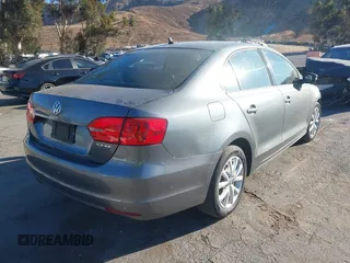 2011 Volkswagen Jetta SE with VIN 3VWDZ7AJ7BM318623, listed as a IAAI auction lot 41131568 with 130,799 mi miles and . Bid and sale history available at DreamBid. Image 4.