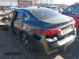 2015 Infiniti Q70 with VIN JN1BY1AR0FM562523, listed as a IAAI auction lot 41310831 with 73,870 mi miles and . Bid and sale history available at DreamBid. Image 3.