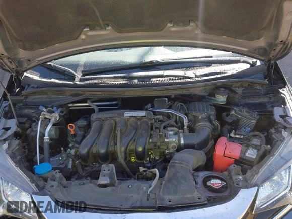 2018 Honda Fit LX with VIN 3HGGK5H51JM731851, listed as a IAAI auction lot 42570144 with 69,236 mi miles and . Bid and sale history available at DreamBid. Image 10.