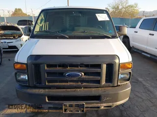 2011 Ford Econoline Cargo Commercial with VIN 1FTNE2EL2BDA71427, listed as a IAAI auction lot 41755582 with 157,531 mi miles. Bid and sale history available at carsss.com. Image 12.