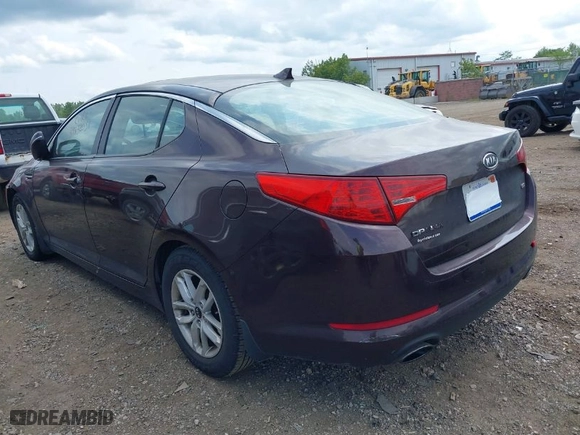 2011 Kia Optima LX with VIN KNAGM4A73B5063778, listed as a IAAI auction lot 39932051 with 143,175 mi miles. Bid and sale history available at carsss.com. Image 3.