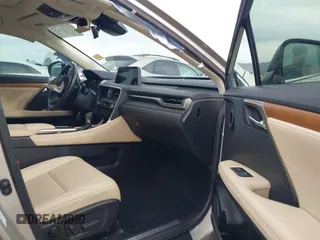 2021 Lexus RX 450h with VIN 2T2HGMDA0MC067228, listed as a IAAI auction lot 41818836 with 28,850 mi miles and . Bid and sale history available at DreamBid. Image 5.