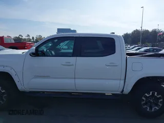 2017 Toyota Tacoma SR5 with VIN 3TMAZ5CN9HM031576, listed as a IAAI auction lot 41457373 with 166,219 mi miles and . Bid and sale history available at DreamBid. Image 15.