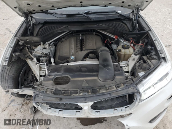 2017 BMW X6 sDrive35i z VIN 5UXKU0C52H0F99663, wystawiony jako Copart lot #89342225 z przebiegiem 71 491 mil mil oraz Szkoda całkowita • Salvage title. Historia ofert i sprzedaży dostępna na DreamBid. Obrazek 14.