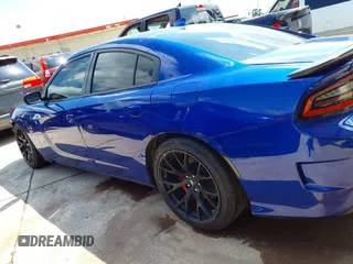 2019 Dodge Charger Scat Pack with VIN 2C3CDXGJ8KH588905, listed as a IAAI auction lot 42211811 with 50,298 mi miles and . Bid and sale history available at carsss.com. Image 15.