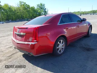 2008 Cadillac CTS RWD w/1SA with VIN 1G6DM577880116793, listed as a IAAI auction lot 42142190 with 191,567 mi miles. Bid and sale history available at carsss.com. Image 4.