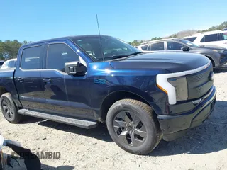 2024 Ford F-150 Lightning Flash with VIN 1FT6W3L75RWG30755, listed as a IAAI auction lot 41817158 with 1,932 mi miles and . Bid and sale history available at DreamBid. Image 13.