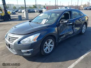 2015 Nissan Altima 2.5 SV with VIN 1N4AL3AP6FC238540, listed as a IAAI auction lot 41576382 with 147,874 mi miles. Bid and sale history available at carsss.com. Image 2.