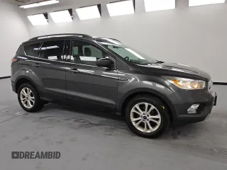 2018 Ford Escape SE with VIN 1FMCU0GD6JUA74555, listed as a Copart auction lot 54448535 with 114,848 mi miles and Clean Title. Bid and sale history available at carsss.com. Image 4.