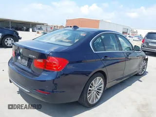 2013 BMW 3 Series 328i with VIN WBA3C1G51DNR49252, listed as a IAAI auction lot 42322739 with 119,421 mi miles and . Bid and sale history available at DreamBid. Image 4.
