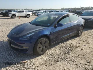 2023 Tesla Model 3 with VIN 5YJ3E1EA9PF712542, listed as a Copart auction lot 52124295 with 13,154 mi miles and Clean title. Bid and sale history available at DreamBid. Image 1.