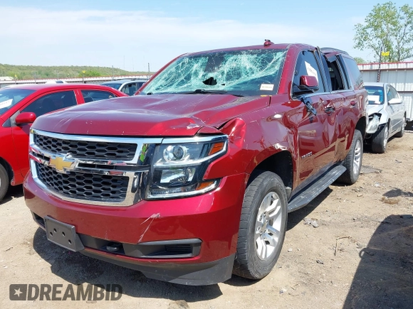 2018 Chevrolet Tahoe LT with VIN 1GNSKBKC6JR215585, listed as a IAAI auction lot 42043898 with 85,730 mi miles and . Bid and sale history available at DreamBid. Image 2.