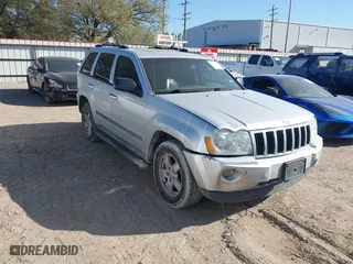 2007 Jeep Grand Cherokee Laredo with VIN 1J8HS48P77C595484, listed as a IAAI auction lot 41775290 with 176,751 mi miles. Bid and sale history available at carsss.com. Image 1.