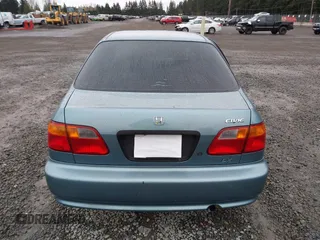 2000 Honda Civic LX with VIN 1HGEJ6677YL000793, listed as a IAAI auction lot 41889317 with 184,766 mi miles. Bid and sale history available at carsss.com. Image 17.