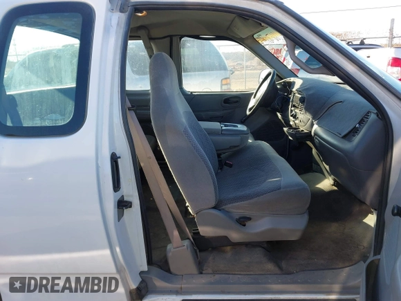 1999 Ford F-150 с VIN 1FTZX1724XKB41653, выставлен на аукционе IAAI как лот 41267645 с пробегом 114 075 миль миль и . История ставок и продаж доступна на DreamBid. Изображение 5.