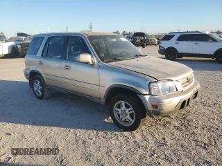 2000 Honda CR-V SE with VIN JHLRD1873YC038760, listed as a Copart auction lot 80396404 with 220,755 mi miles and Clean Title. Bid and sale history available at carsss.com. Image 4.