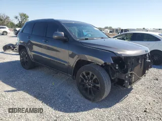 2017 Jeep Grand Cherokee 75th Anniversary with VIN 1C4RJEAG4HC700191, listed as a Copart auction lot 52520655 with 130,828 mi miles and Salvage title. Bid and sale history available at DreamBid. Image 4.