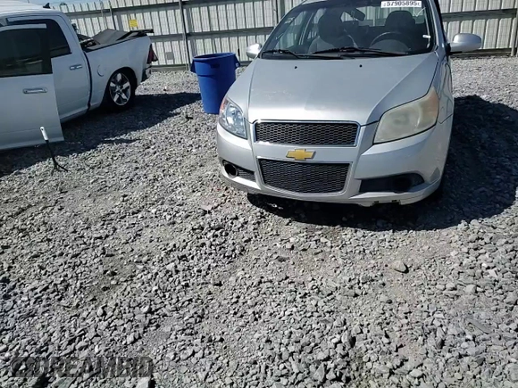 2009 Chevrolet Aveo 1LT z VIN KL1TD66E79B615600, wystawiony jako Copart lot #57905895 z przebiegiem 116 465 mil mil oraz Szkoda całkowita • Salvage title. Historia ofert i sprzedaży dostępna na DreamBid. Obrazek 13.