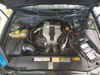 2000 Cadillac Catera z VIN W06VR54R7YR124650, wystawiony jako Copart lot #49602314 z przebiegiem 77 800 mil mil oraz Nie do naprawy. Historia ofert i sprzedaży dostępna na DreamBid. Obrazek 11.