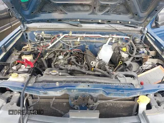 2002 Nissan Frontier SE z VIN 1N6ED27T12C373553, wystawiony jako IAAI lot #42064112 z przebiegiem 230 908 mil mil oraz . Historia ofert i sprzedaży dostępna na DreamBid. Obrazek 10.