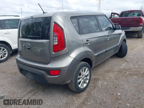 2012 Kia Soul + with VIN KNDJT2A65C7403493, listed as a IAAI auction lot 42095119 with 151,258 mi miles. Bid and sale history available at carsss.com. Image 4.