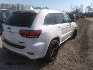 2020 Jeep Grand Cherokee Trackhawk z VIN 1C4RJFN94LC117596, wystawiony jako IAAI lot #36356989 z przebiegiem 37 994 mil mil oraz . Historia ofert i sprzedaży dostępna na DreamBid. Obrazek 4.