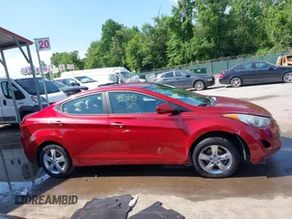 2013 Hyundai Elantra GLS z VIN 5NPDH4AE4DH405444, wystawiony jako IAAI lot #42201093 z przebiegiem 125 900 mil mil oraz . Historia ofert i sprzedaży dostępna na DreamBid. Obrazek 13.