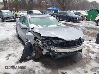2019 Acura TLX with VIN 19UUB1F38KA009420, listed as a IAAI auction lot 41459987 with 102,336 mi miles. Bid and sale history available at carsss.com. Image 1.