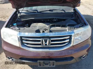 2014 Honda Pilot EX-L with VIN 5FNYF4H52EB055650, listed as a IAAI auction lot 41544068 with 205,942 mi miles and . Bid and sale history available at DreamBid. Image 10.