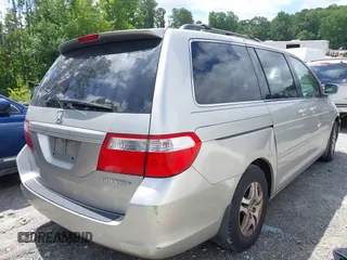 2005 Honda Odyssey EX-L with VIN 5FNRL38745B083510, listed as a IAAI auction lot 42534287 with 304,298 mi miles and . Bid and sale history available at DreamBid. Image 4.