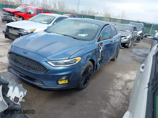 2019 Ford Fusion Energi Titanium with VIN 3FA6P0SU0KR111372, listed as a IAAI auction lot 41685702 with 107,407 mi miles. Bid and sale history available at carsss.com. Image 17.