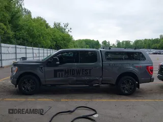 2021 Ford F-150 XL with VIN 1FTFW1E58MFA37383, listed as a IAAI auction lot 42396331 with 149,965 mi miles and . Bid and sale history available at DreamBid. Image 14.