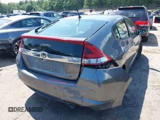 2013 Honda Insight with VIN JHMZE2H31DS002352, listed as a IAAI auction lot 42551515 with 148,393 mi miles and . Bid and sale history available at DreamBid. Image 4.