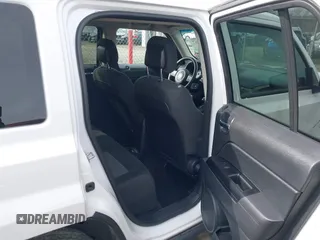 2015 Jeep Patriot Sport with VIN 1C4NJRBBXFD317811, listed as a IAAI auction lot 41579467 with 107,002 mi miles and . Bid and sale history available at carsss.com. Image 8.