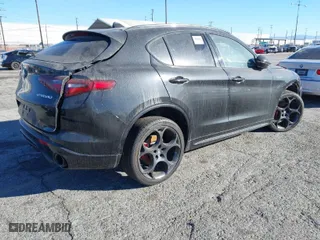 2022 Alfa Romeo Stelvio Ti with VIN ZASPAKBN5N7D24275, listed as a IAAI auction lot 41360975 with 24,668 mi miles. Bid and sale history available at carsss.com. Image 4.