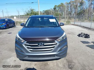 2017 Hyundai Tucson SE Plus with VIN KM8J33A45HU420349, listed as a IAAI auction lot 41296190 with 77,910 mi miles. Bid and sale history available at carsss.com. Image 12.