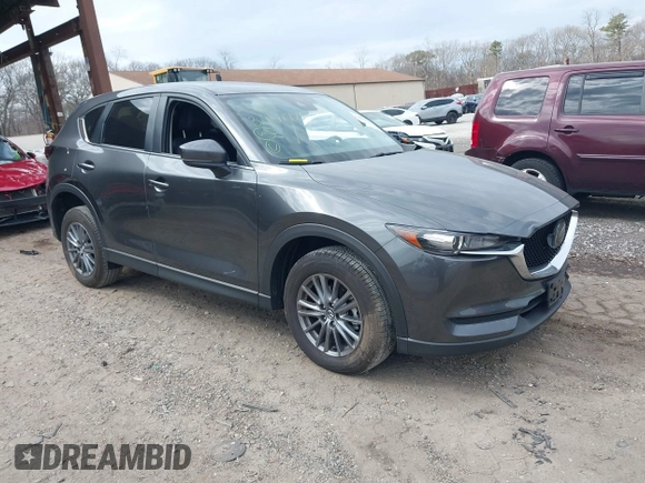 2021 Mazda CX-5 Touring with VIN JM3KFBCM8M0492145, listed as a IAAI auction lot 39077248 with 20,408 mi miles. Bid and sale history available at carsss.com. Image 1.