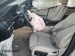 2015 BMW 6 Series 640i z VIN WBA6A0C59FD318390, wystawiony jako Copart lot #87831165 z przebiegiem Nie podano mil oraz Szkoda całkowita • Salvage title. Historia ofert i sprzedaży dostępna na DreamBid. Obrazek 7.