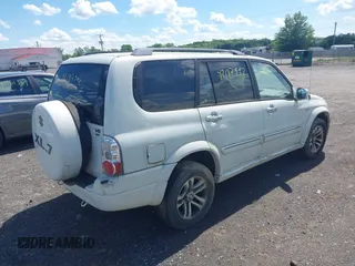 2004 Suzuki XL7 LX z VIN JS3TX92V344103015, wystawiony jako IAAI lot #42187592 z przebiegiem 161 614 mil mil oraz . Historia ofert i sprzedaży dostępna na DreamBid. Obrazek 4.
