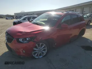 2014 Mazda CX-5 Grand Touring with VIN JM3KE4DY9E0419111, listed as a Copart auction lot 52250315 with 130,003 mi miles and Salvage Title. Bid and sale history available at DreamBid. Image 1.