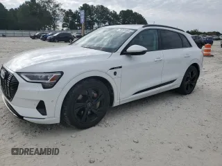 2021 Audi e-tron Premium with VIN WA1AAAGEXMB012122, listed as a Copart auction lot 75797084 with 27,971 mi miles and Salvage Title. Bid and sale history available at carsss.com. Image 1.