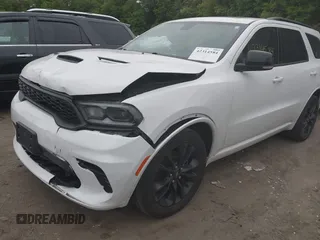 2021 Dodge Durango GT Plus z VIN 1C4RDJDG9MC757654, wystawiony jako IAAI lot #42314584 z przebiegiem 29 879 mil mil oraz . Historia ofert i sprzedaży dostępna na DreamBid. Obrazek 2.