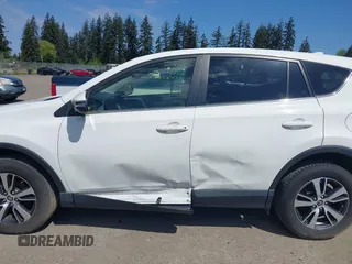 2018 Toyota RAV4 XLE with VIN JTMWFREV3JD130995, listed as a IAAI auction lot 42183630 with 56,624 mi miles. Bid and sale history available at carsss.com. Image 15.