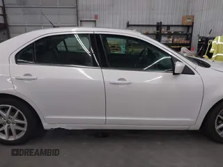 2012 Ford Fusion SEL z VIN 3FAHP0JAXCR104902, wystawiony jako IAAI lot #42471136 z przebiegiem 186 468 mil mil oraz . Historia ofert i sprzedaży dostępna na DreamBid. Obrazek 13.
