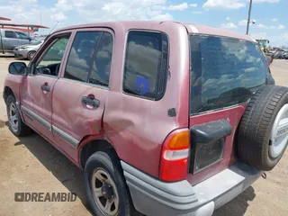 2000 Chevrolet Tracker with VIN 2CNBE13C7Y6956063, listed as a IAAI auction lot 42805919 with 176,684 mi miles and . Bid and sale history available at DreamBid. Image 6.